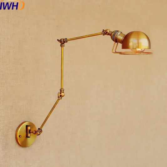 Brass-finished adjustable industrial led wall lamp with dome-shaped shade and articulated arms for bedroom reading light