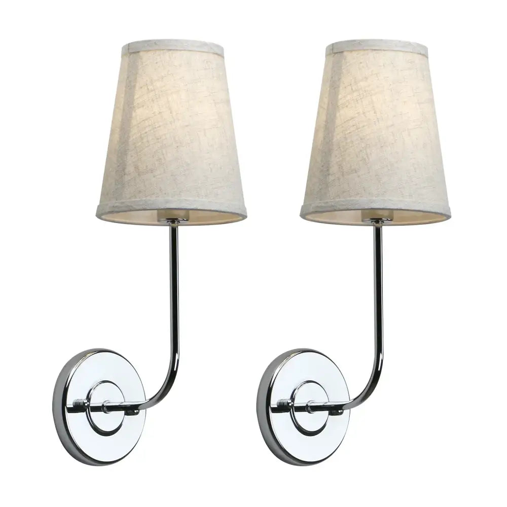 Pair of chrome-finished wall lamp set with beige linen shades ideal for bedroom reading in industrial brass style