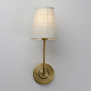 Industrial brass wall lamps set of 2 featuring slender stems and tapered linen shades for bedroom decorbites industrial wall
