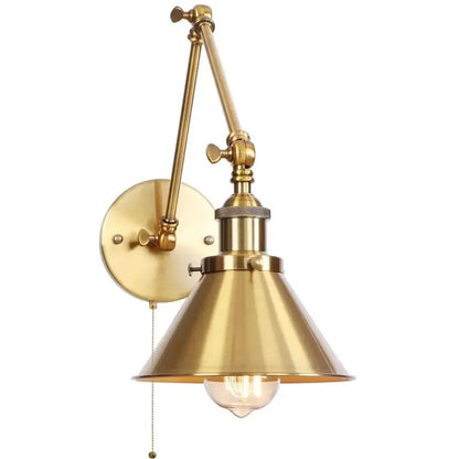 Industrial brass wall sconce with pull chain switch featuring adjustable conical shade and exposed bulb for bedroom use