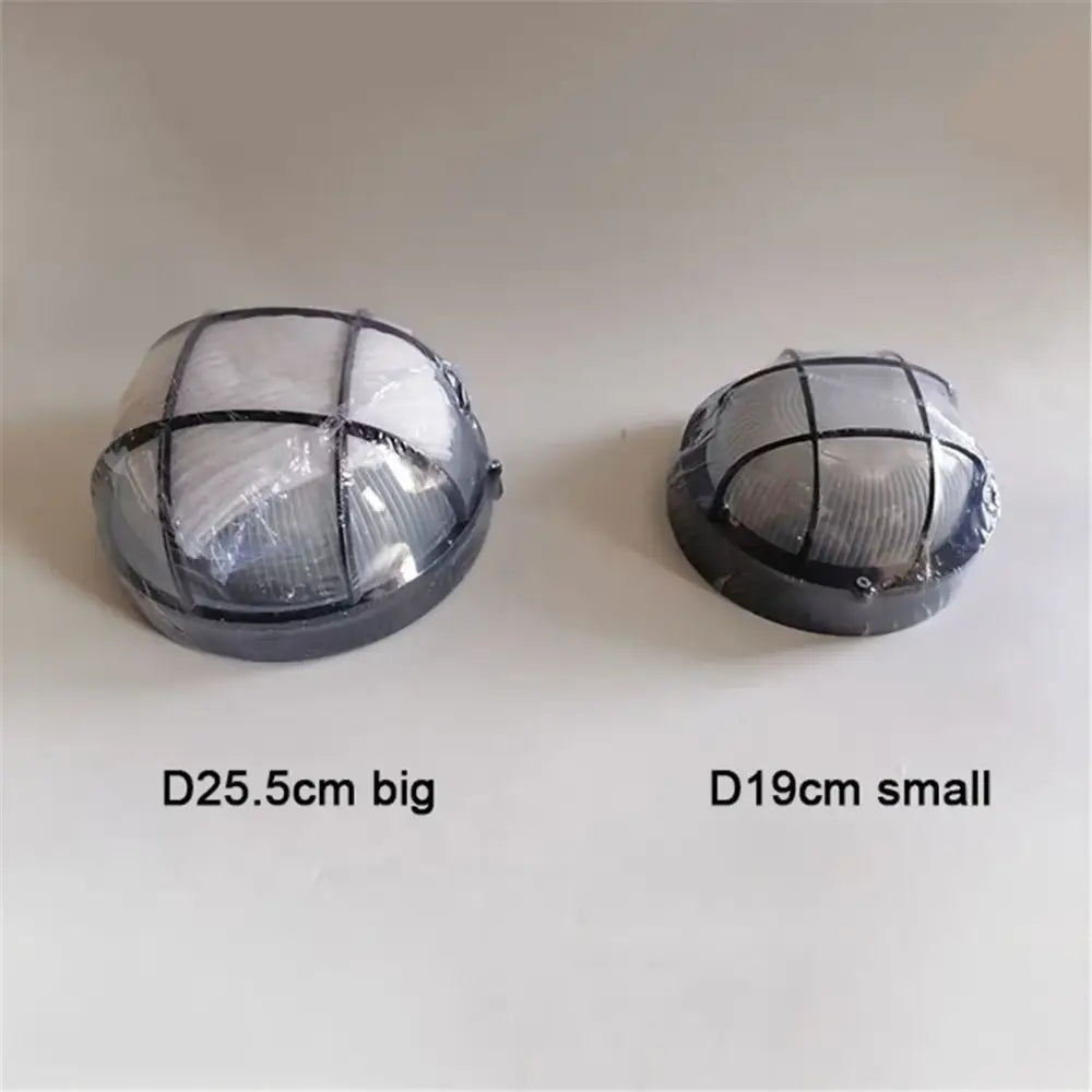 Black dome-shaped industrial bronze metal cage outdoor ceiling lamp with frosted glass panels and protective grid cage