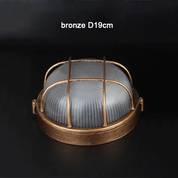 Bronze industrial outdoor ceiling lamp with ribbed frosted glass dome and protective metal cage for yard lighting