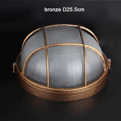 Industrial bronze metal cage outdoor ceiling lamp with frosted glass dome and protective cage for outdoor ceiling use