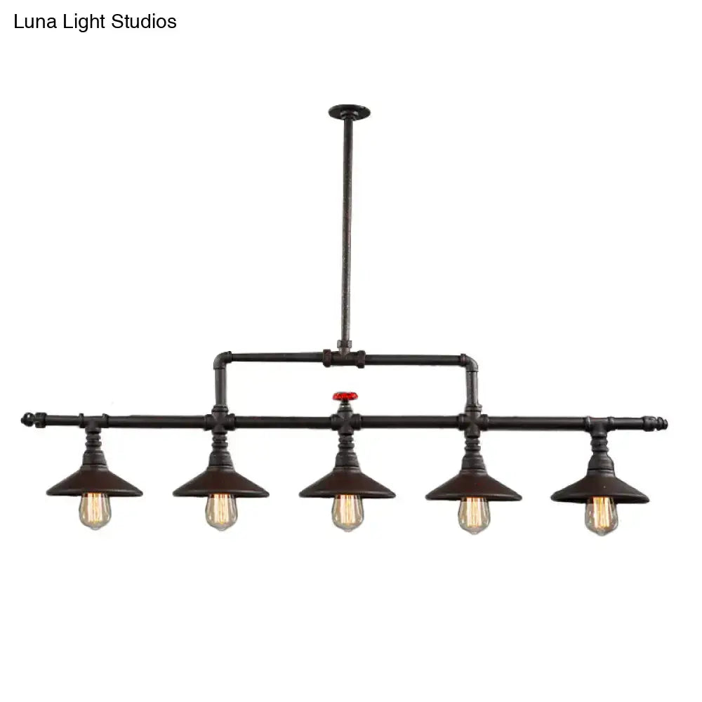 Industrial bronze pipe island light dining room pendant with five exposed filament bulbs and a central red valve accent