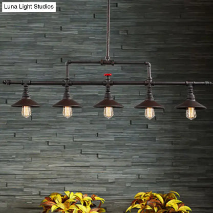 Industrial bronze pipe island light with five exposed filament bulbs and red valve accent for dining room pendant