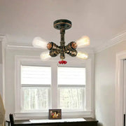 Industrial bronze semi flush foyer light with dark rustic metal frame and five decorative valve bulb base edison bulbs
