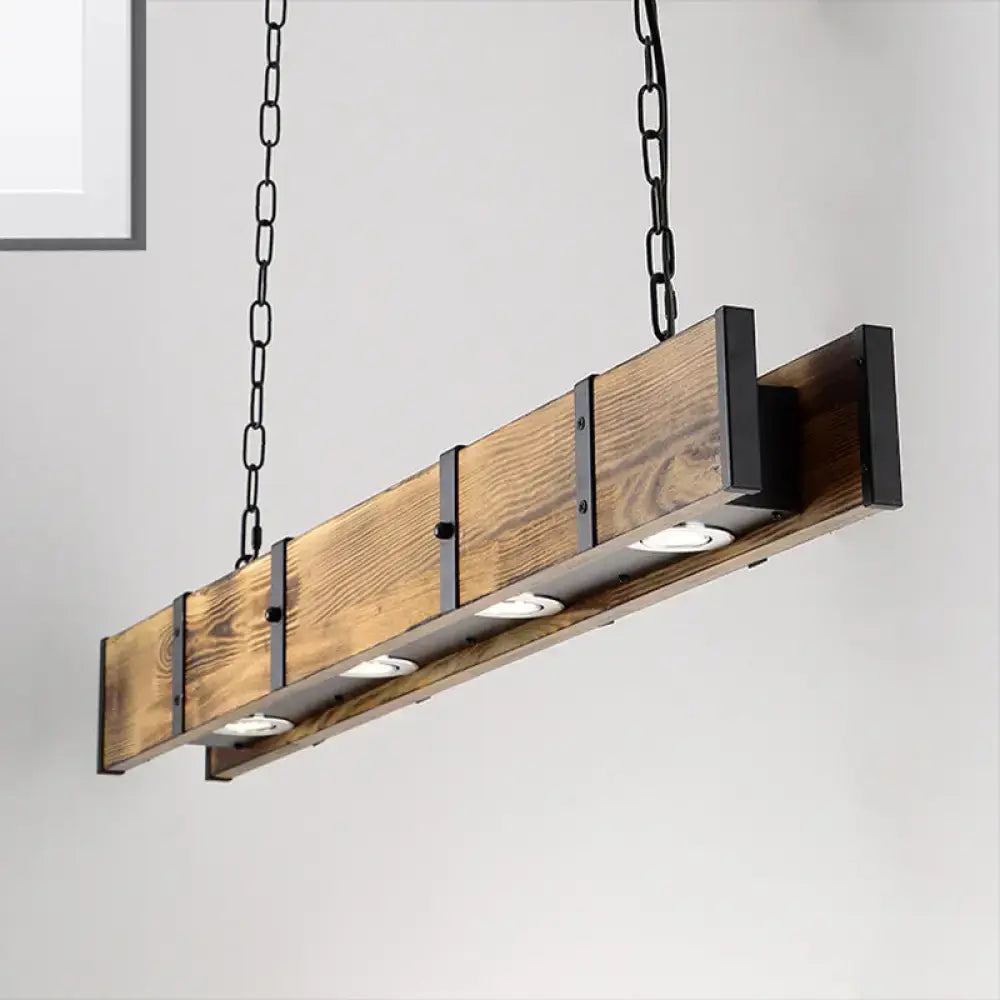 Industrial brown rectangular wooden island ceiling light with wooden beams black metal accents and chain suspension