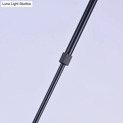 Black metal tripod leg with textured adjustment collar for decorbites industrial brown island lighting with clear glass shades