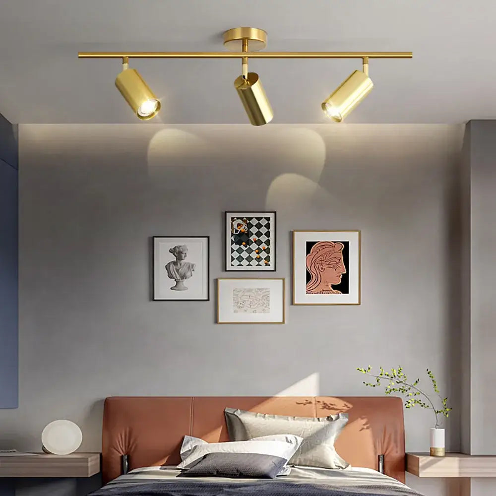Gold-colored industrial brushed brass 3 light ceiling light with adjustable spotlights for living room decorbites industrial ceiling