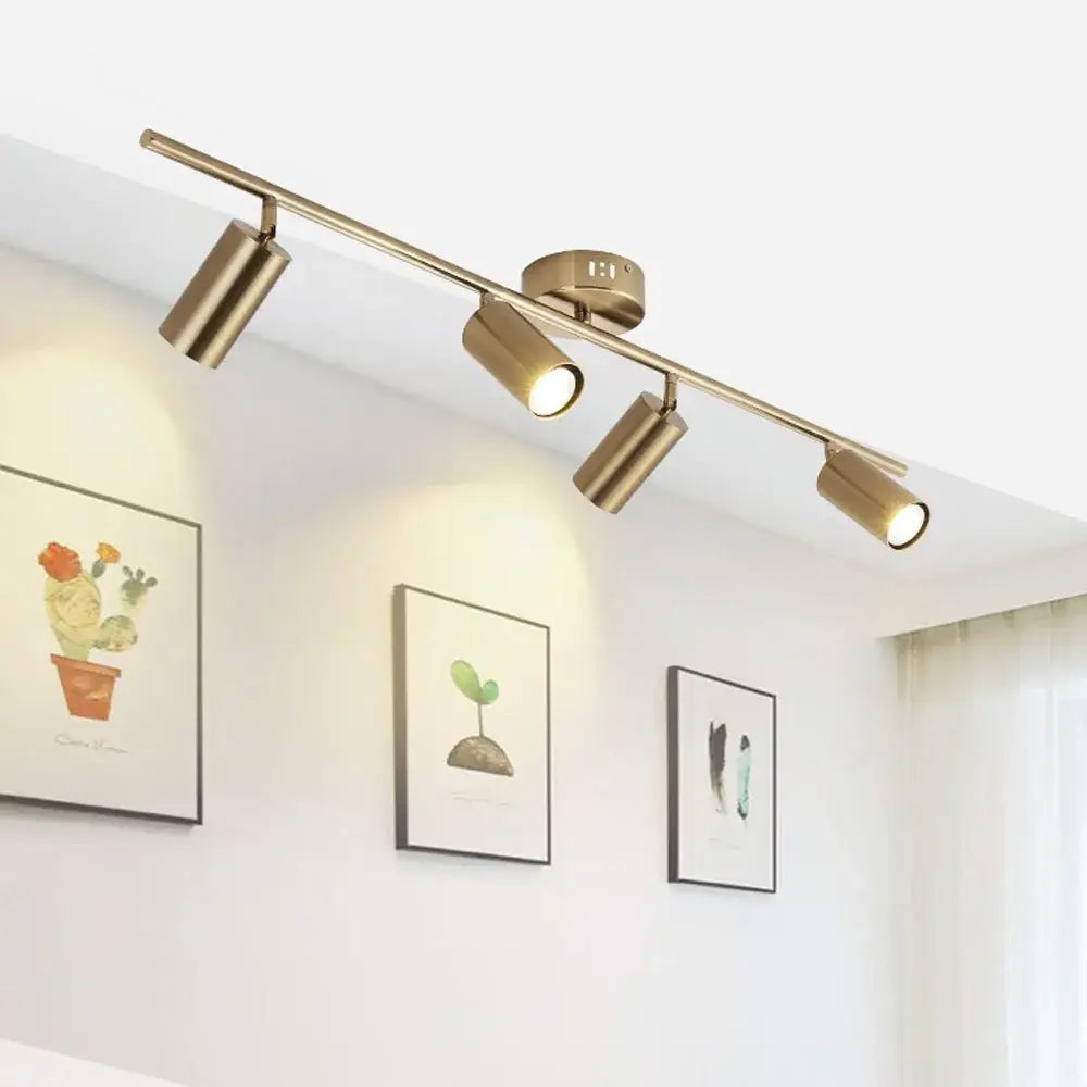 Modern gold-finished industrial ceiling light with four adjustable spotlights for living room decorbites industrial ceiling lighting