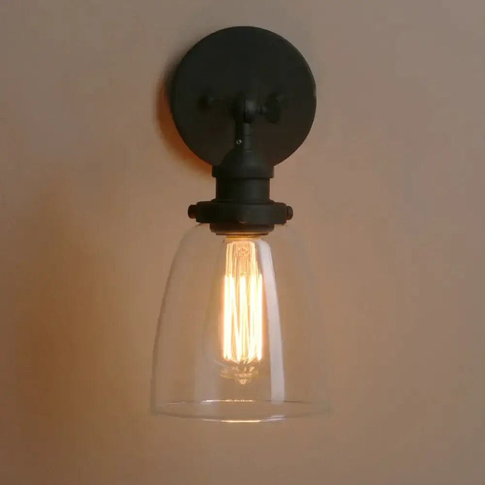 Black metal wall lamp with clear glass shade and exposed filament bulb for industrial decorbites clear glass style