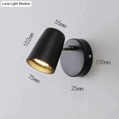 Industrial led wall sconce with black matte finish and gold interior lining for bedroom spotlight lighting