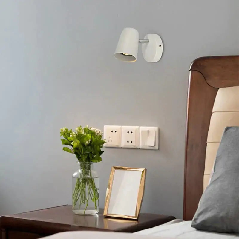 White wall-mounted industrial led wall sconce with brushed nickel finish and sleek modern design for bedroom spotlight