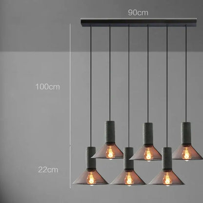 Industrial cement metal pendant light with five dark gray concrete shades and exposed filament bulbs for dining room decorbites industrial cement