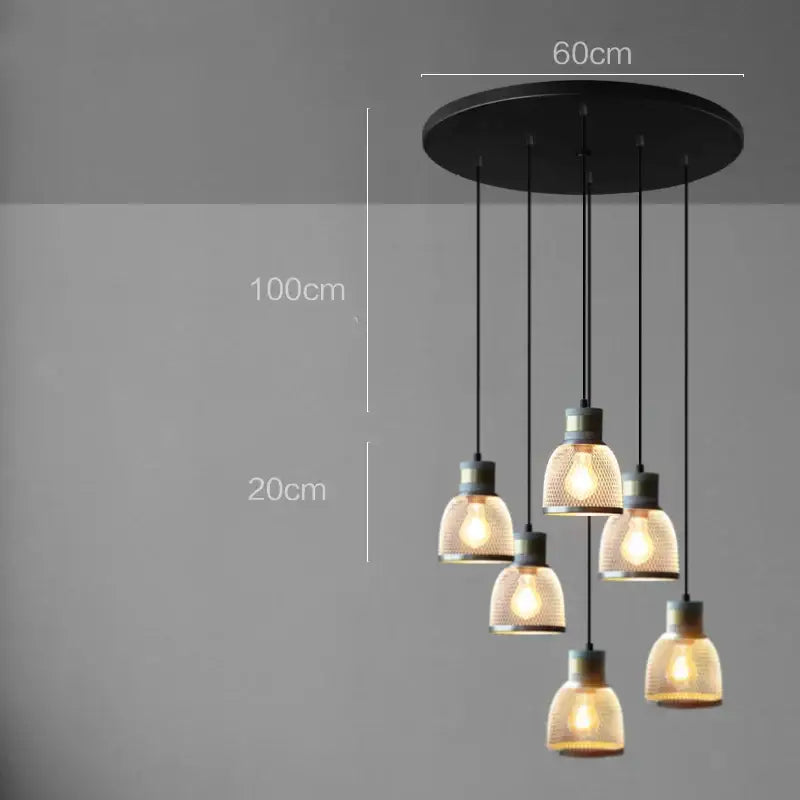 Black circular industrial cement metal pendant light with five warm-toned glass shades and brass accents for dining room decorbites industrial cement