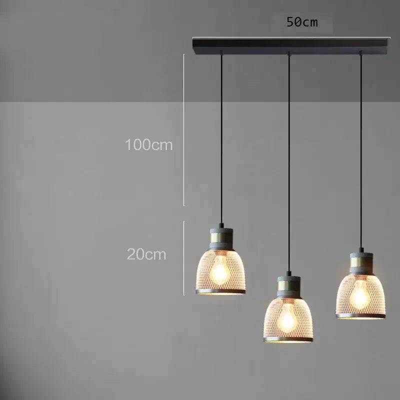 Industrial cement metal pendant light with matte black bar brass accents and woven mesh glass shades for dining room decorbites industrial cement