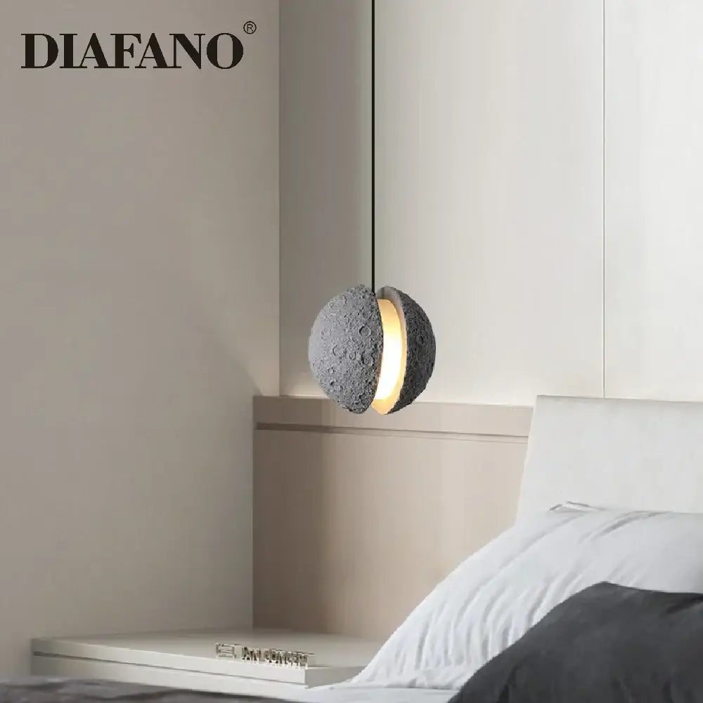 Gray moon star industrial cement pendant light with textured spherical design and warm glow for dining room decorbites industrial cement pendant