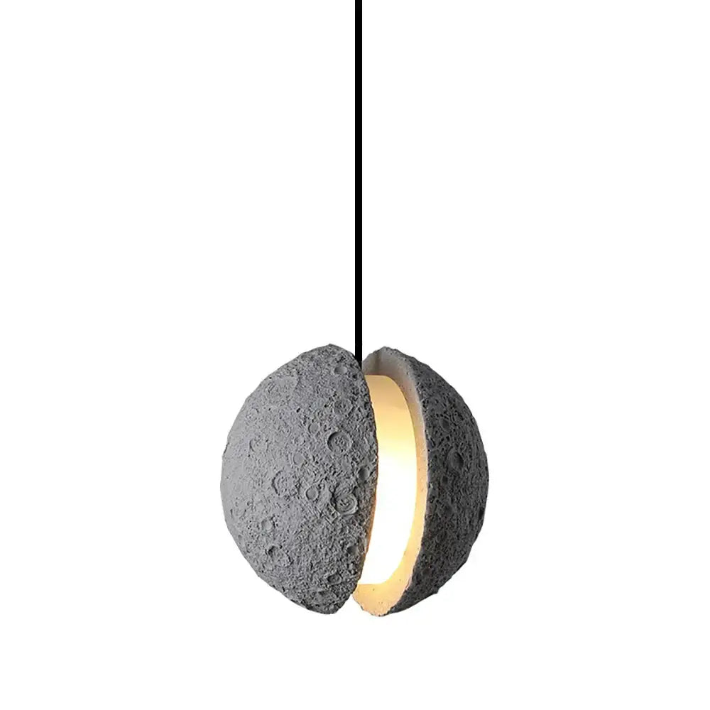 Gray concrete moon-shaped industrial cement pendant light with warm glow for dining room decorbites industrial cement pendant