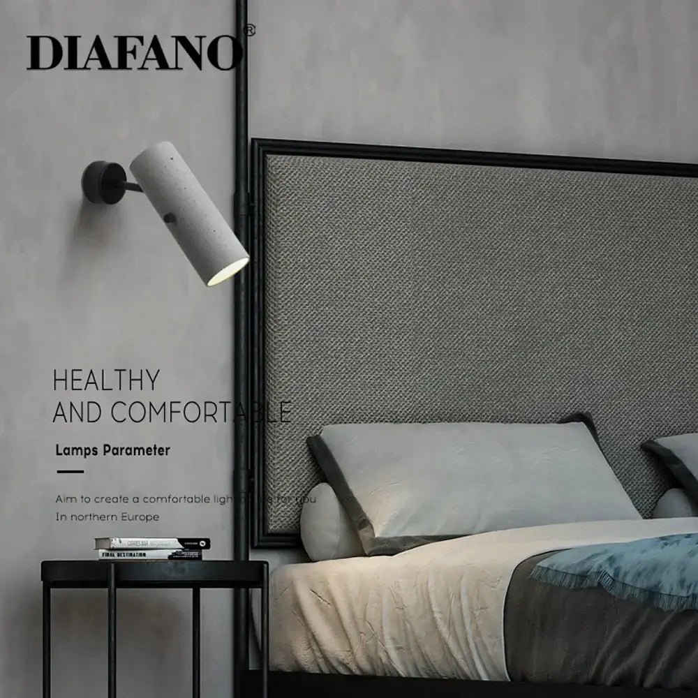 Concrete finished cylindrical wall lamp with matte black base by diafano for decorbites industrial cement wall lighting