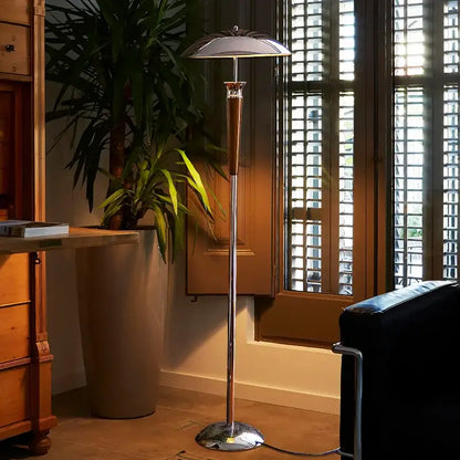 Industrial chrome and wood floor lamp with chrome finish tapered stem and dome-shaped shade for decorbites industrial desk use