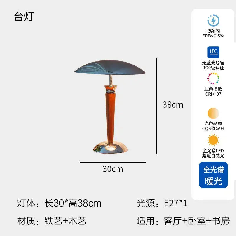 A sleek 38cm decorbites industrial desk lamp with a dark blue curved shade and polished wood base with ironwork accents
