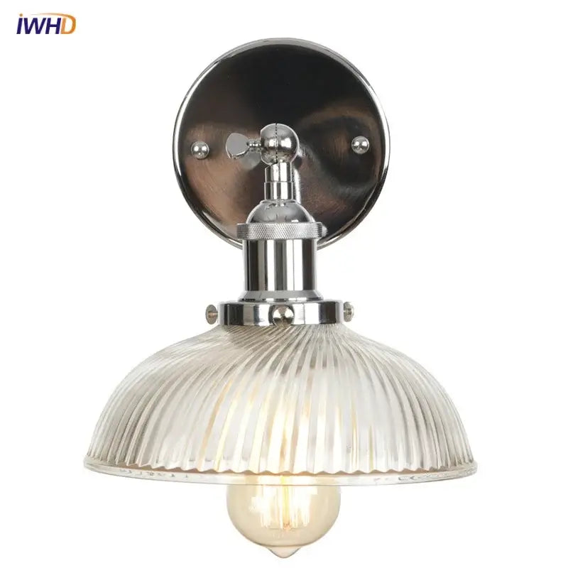 Industrial chrome wall sconce with clear ribbed glass shade and exposed filament bulb for stairway lighting decorbites clear glass