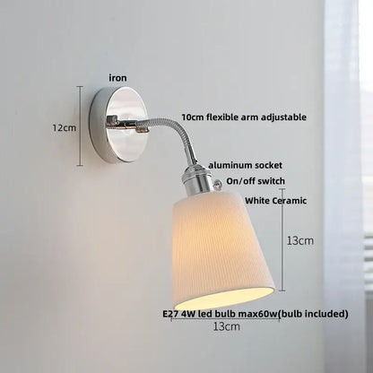 A sleek industrial chrome wall lamp sconce with a flexible 10cm arm and white ceramic shade for bedroom reading light