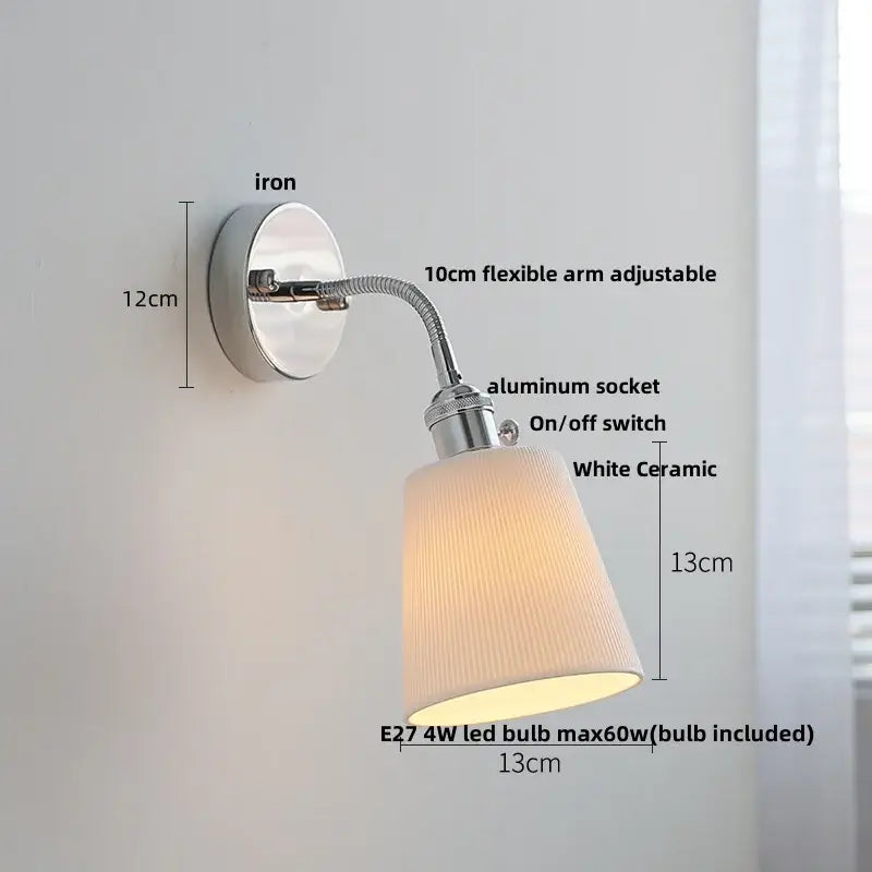 A sleek industrial chrome wall lamp sconce with a flexible 10cm arm and white ceramic shade for bedroom reading light