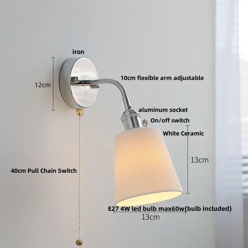 A sleek industrial chrome led wall lamp sconce with a flexible arm and white ceramic shade for bedroom reading light