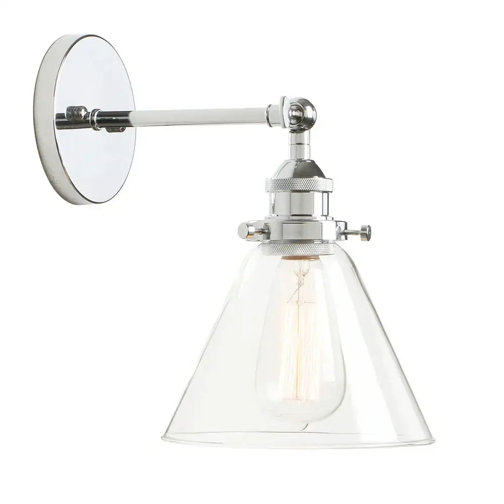 Chrome finished industrial wall sconce with clear glass shade and exposed Edison bulb bedroom light fixture