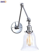 Chrome industrial led wall sconce with adjustable swing arm, clear glass bell shade, and exposed Edison bulb for bedroom decorbites