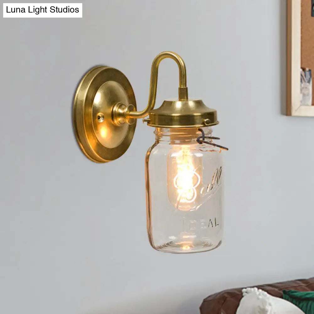 DecorBites™ DecorBites™ Industrial Clear Glass Wall Sconce with Brass Finish and Letter Detail