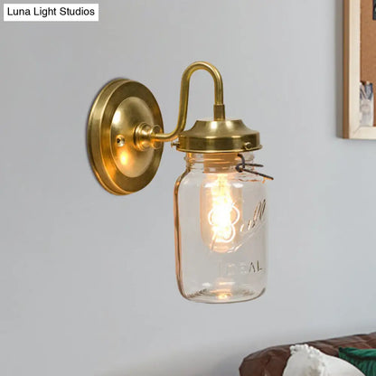 DecorBites™ DecorBites™ Industrial Clear Glass Wall Sconce with Brass Finish and Letter Detail