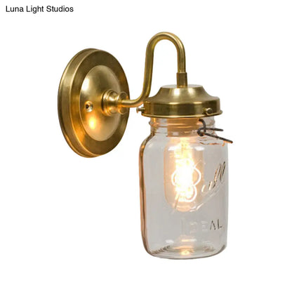 DecorBites™ DecorBites™ Industrial Clear Glass Wall Sconce with Brass Finish and Letter Detail