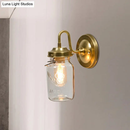 DecorBites™ DecorBites™ Industrial Clear Glass Wall Sconce with Brass Finish and Letter Detail