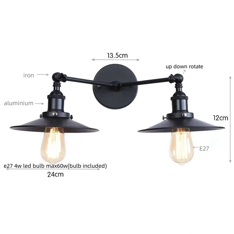 Black industrial-style dual head pink led wall light with adjustable arms and vintage edison bulb shades by decorbites