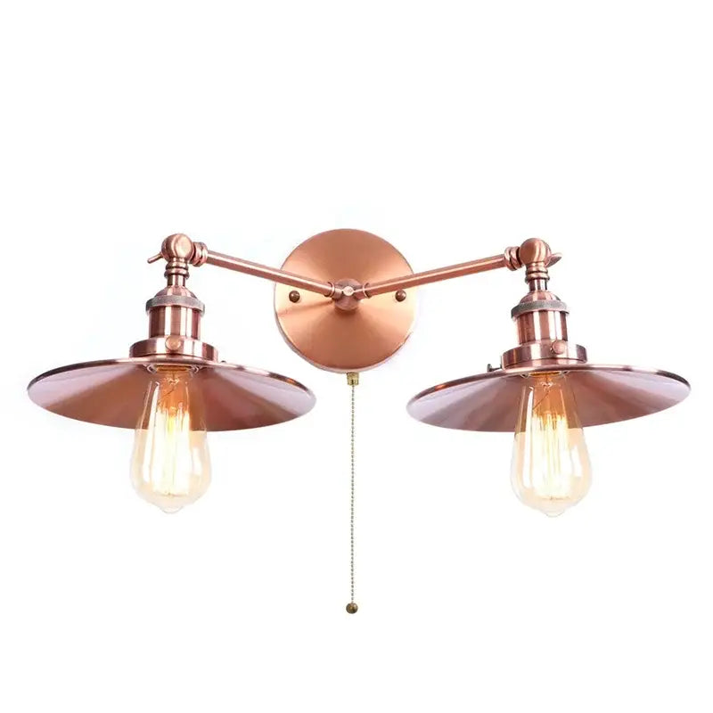 Copper-toned industrial wall light decorbites dual head with two exposed filament bulbs and matching flared shades for bedroom