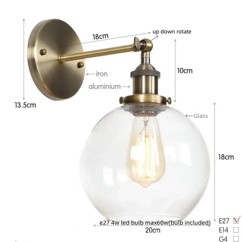 Antique brass bedside lamp with decorbites glass globe and exposed edison-style bulb for bedroom sconce decor