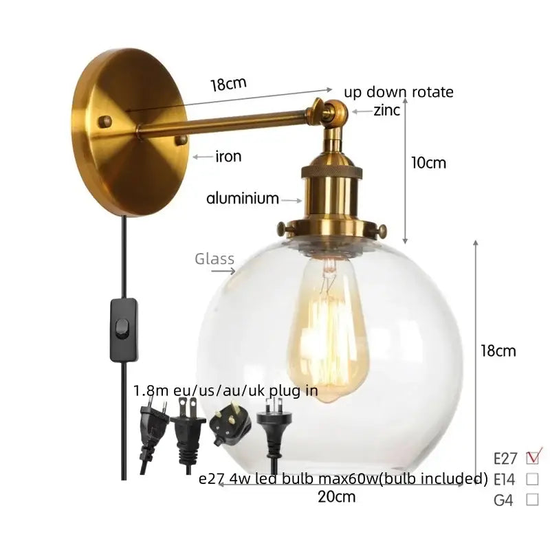 Vintage-style brass wall sconce with a clear decorbites glass globe housing an Edison filament glass globe led bulb