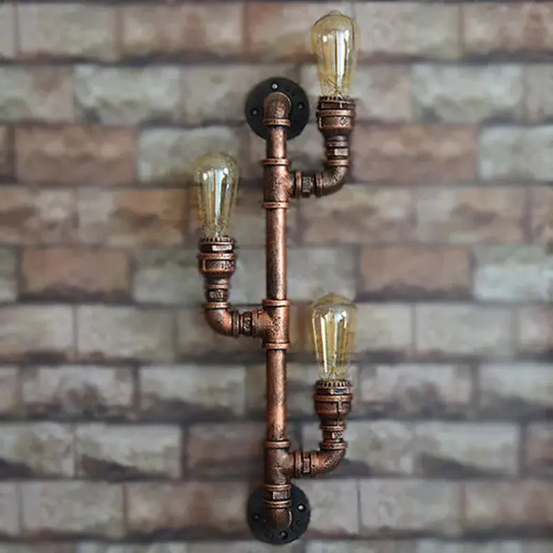 Industrial copper iron pipe wall sconce with triple vintage edison bulbs for decorbites industrial iron decor