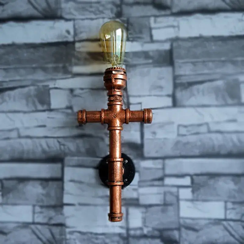 Industrial copper iron pipe wall sconce with vintage filament bulbs for living room decorbites industrial iron lighting