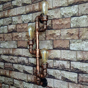 Industrial copper iron pipe wall sconce with three vintage edison bulbs for decorbites industrial iron lighting decor