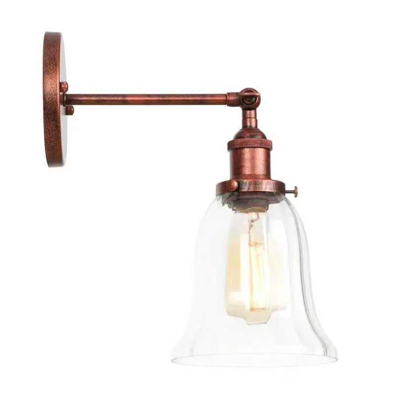 Antique brass wall light with clear glass bell-shaped shade and exposed filament bulb from decorbites loft clear collection