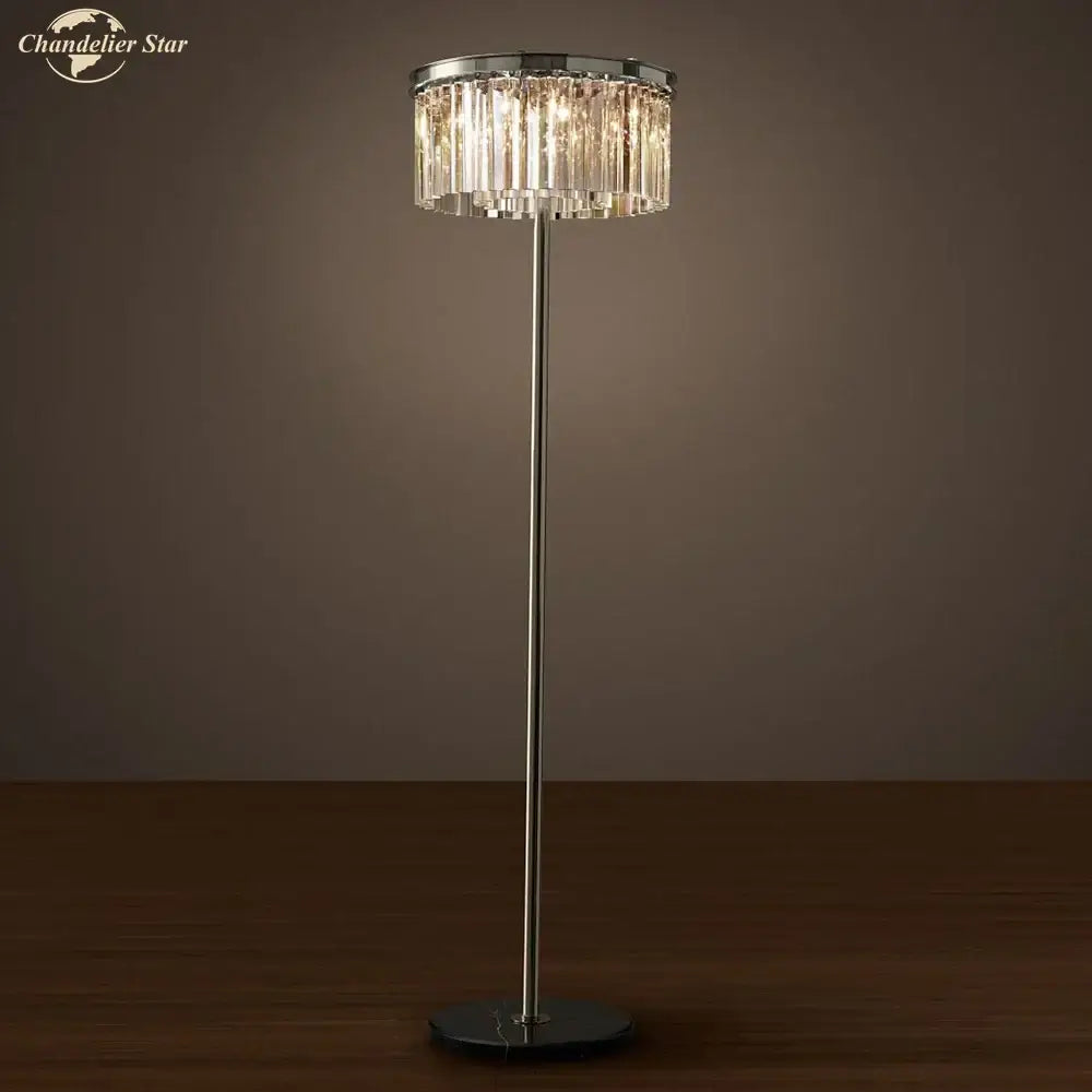 A sleek industrial crystal led floor lamp with black chrome pole and circular chandelier shade for living room decorbites