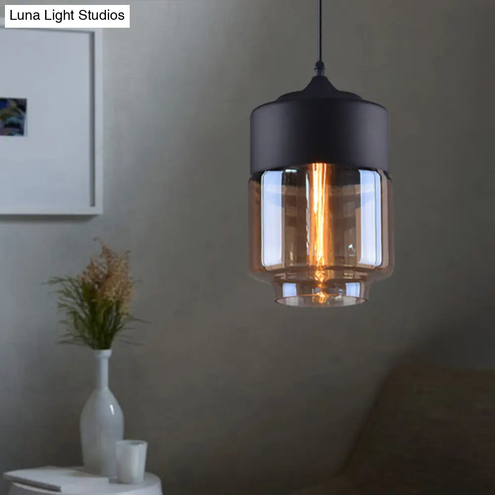 Industrial Cylinder Pendant Light with Brown Glass Shade - 1-Light Hanging Ceiling Fixture in Black, 5"/7"/8" Wide