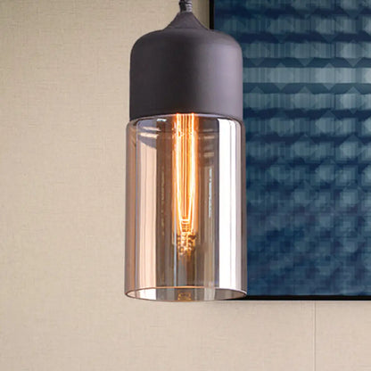 Industrial Cylinder Pendant Light with Brown Glass Shade - 1-Light Hanging Ceiling Fixture in Black, 5"/7"/8" Wide