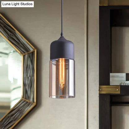 Industrial Cylinder Pendant Light with Brown Glass Shade - 1-Light Hanging Ceiling Fixture in Black, 5"/7"/8" Wide