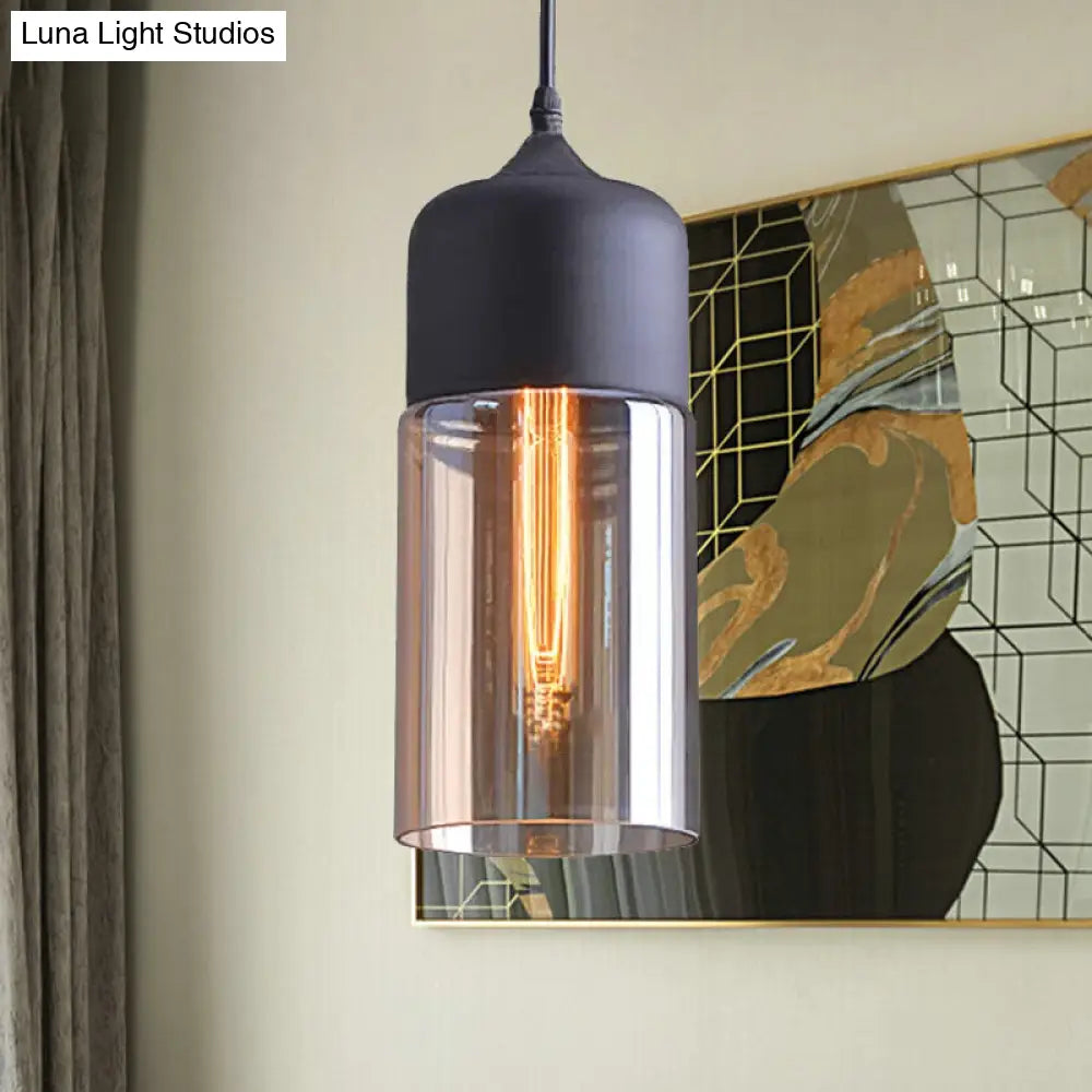 Industrial Cylinder Pendant Light with Brown Glass Shade - 1-Light Hanging Ceiling Fixture in Black, 5"/7"/8" Wide