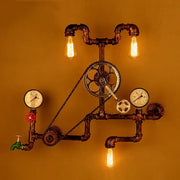 Industrial dark brass pipe wall lights featuring gears chains and three exposed filament bulbs for living room use