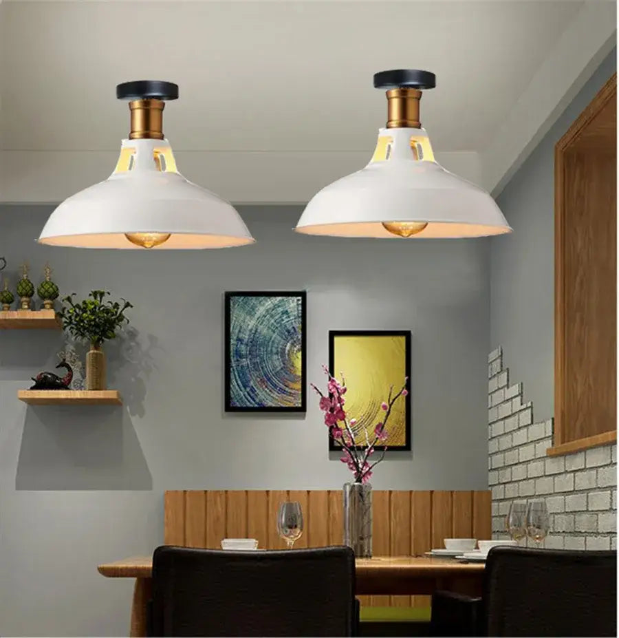 White industrial dome metal ceiling light shade with brass accents and black mounting hardware for kitchen bar lighting